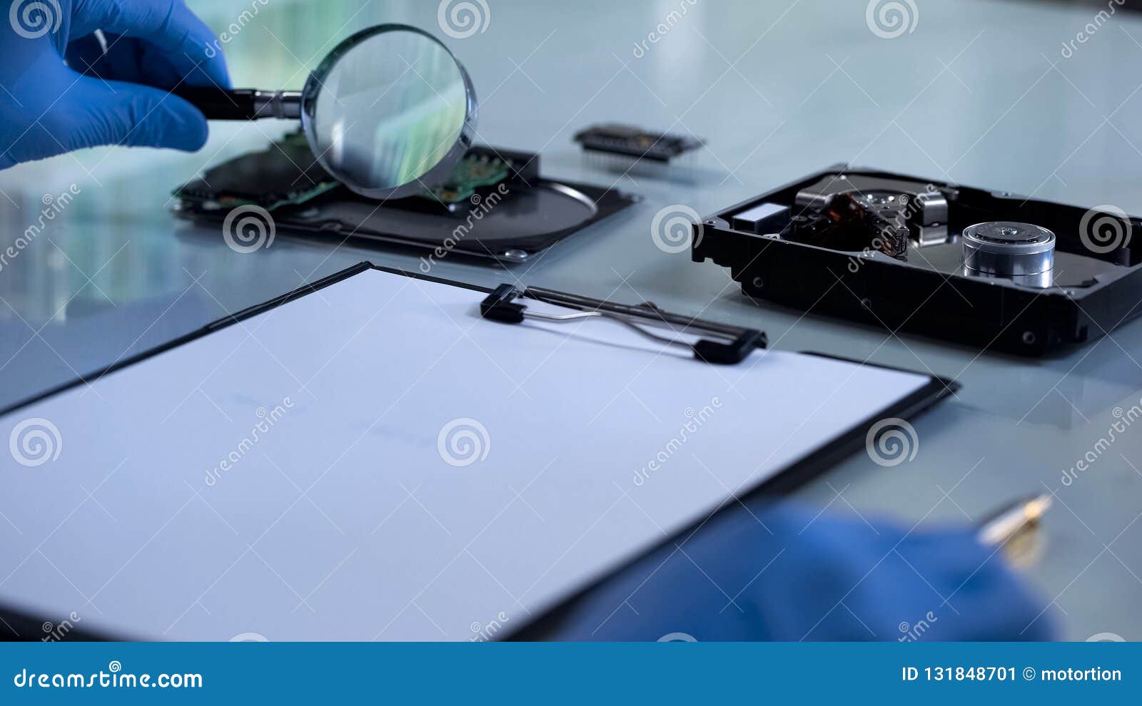 Technician in Gloves Looking at Microcircuit through Magnifying Glass ...