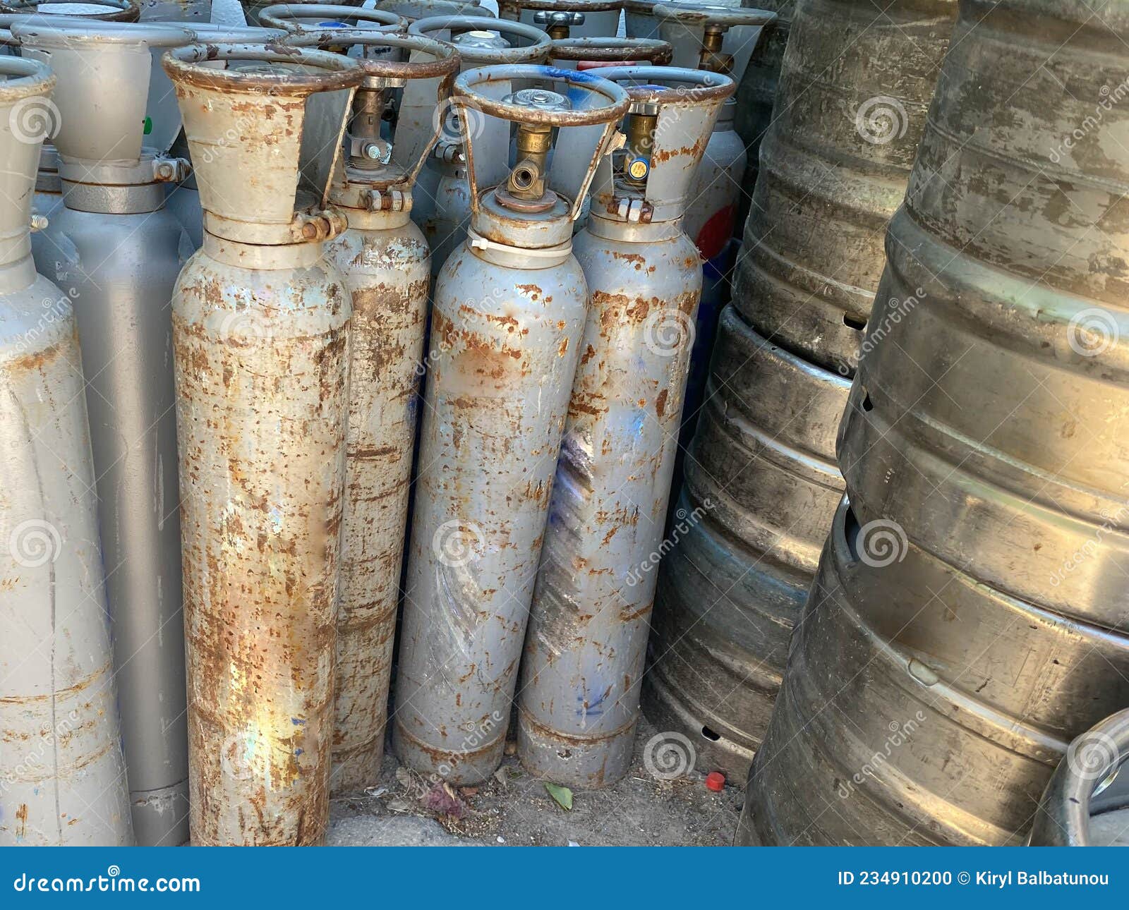 Technician Inspecting Gas Canisters for Welding in Production Line