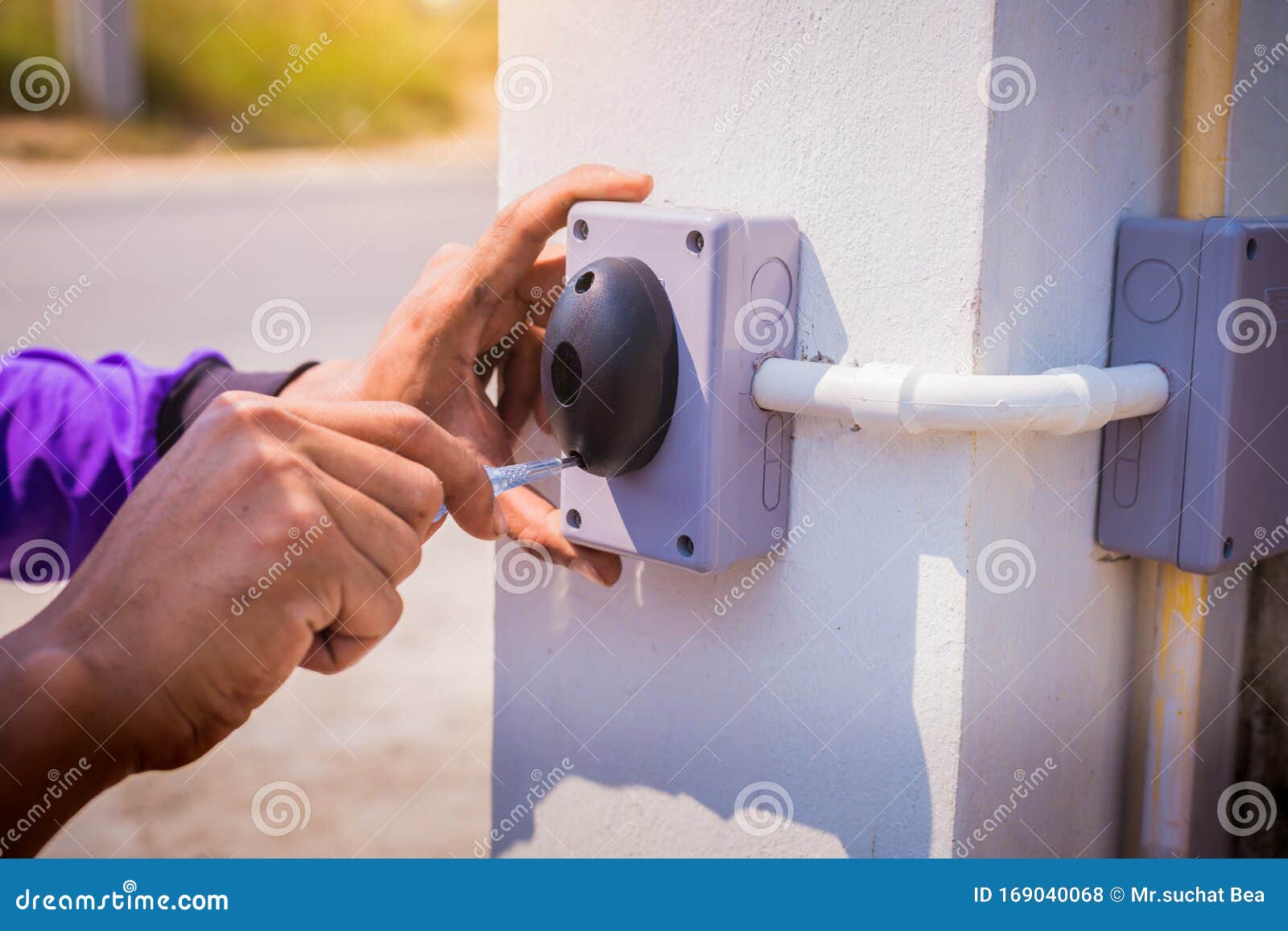 Technician Installed and Test Motion Sensor To Control Gate for Motor