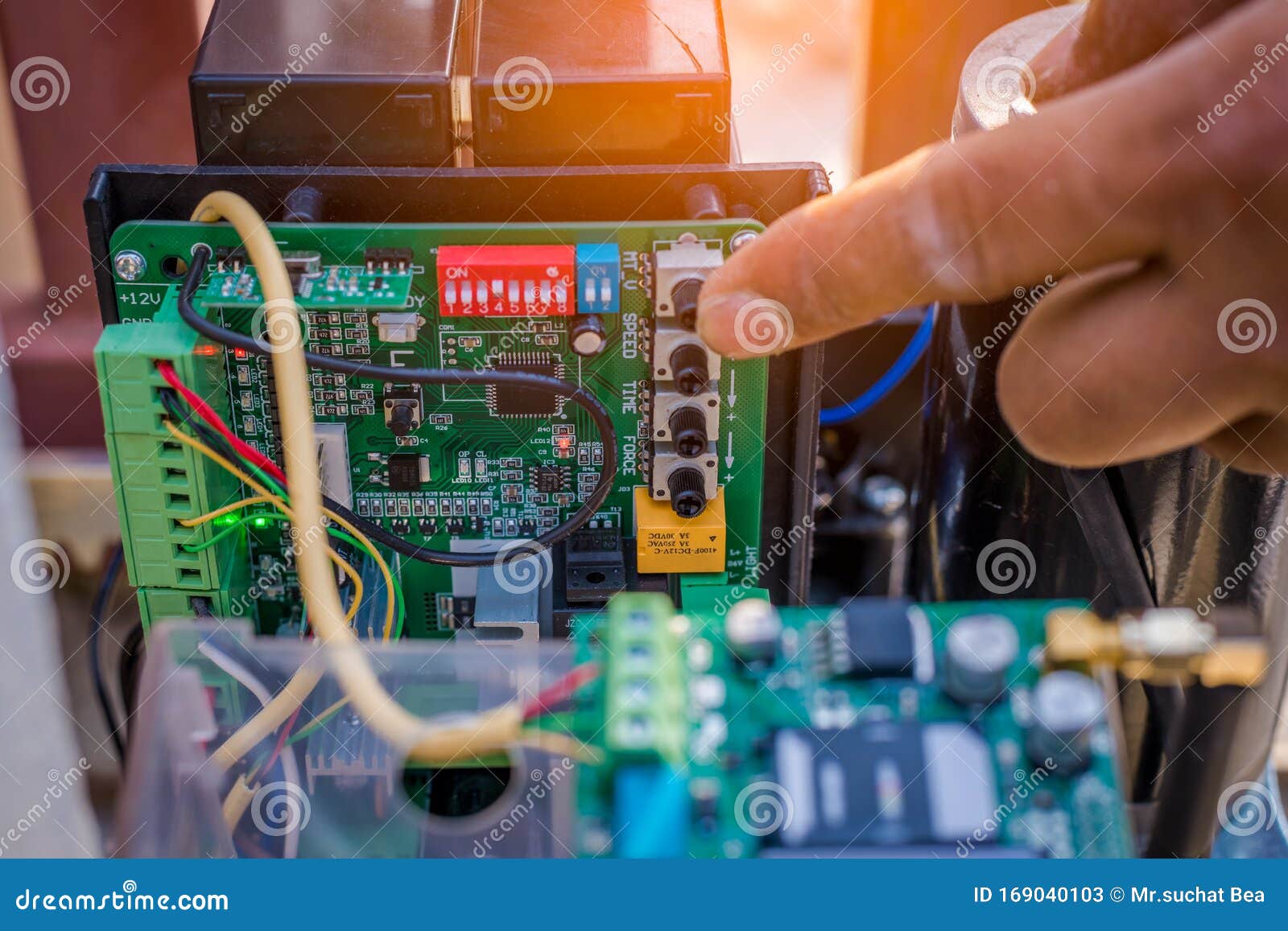 Technician Installed and Test Motion Sensor To Control Gate for Motor