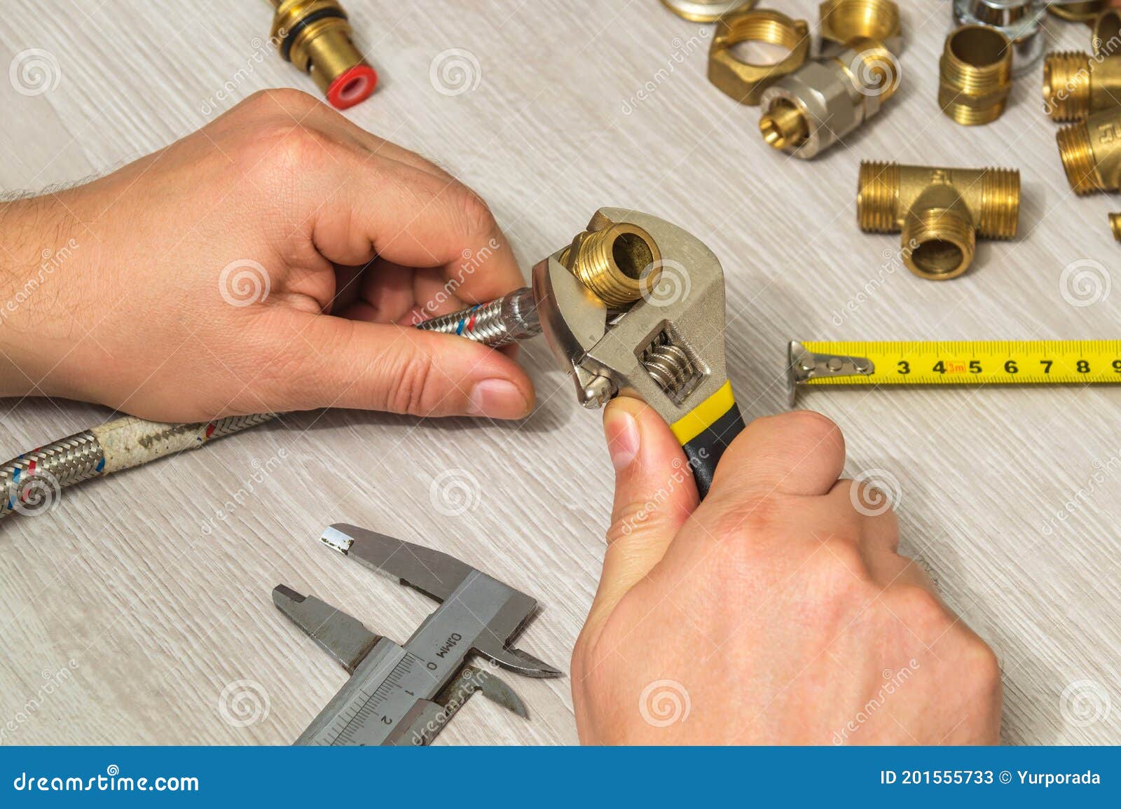 Technician Installs the Fitting on the Hose Using an Adjustable Wrench Stock Image Image of