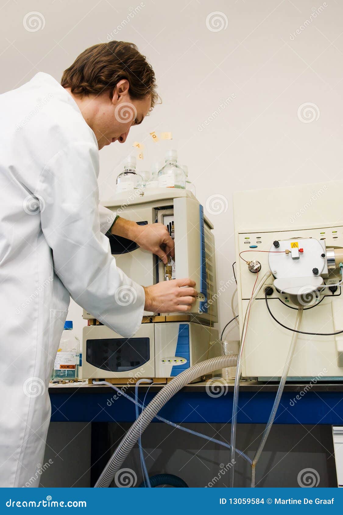 Technician in Laboratory stock photo. Image of analytical 13059584