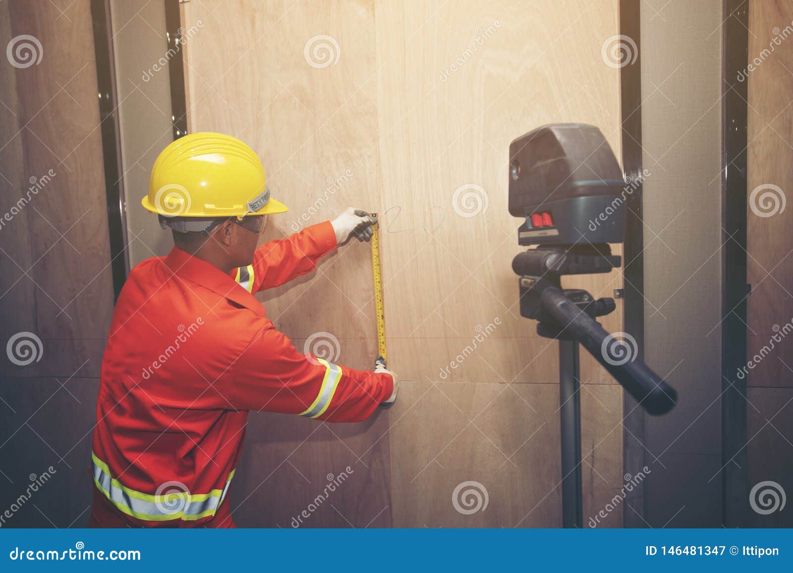 Technician with Laser Measurement Level Stock Image Image of