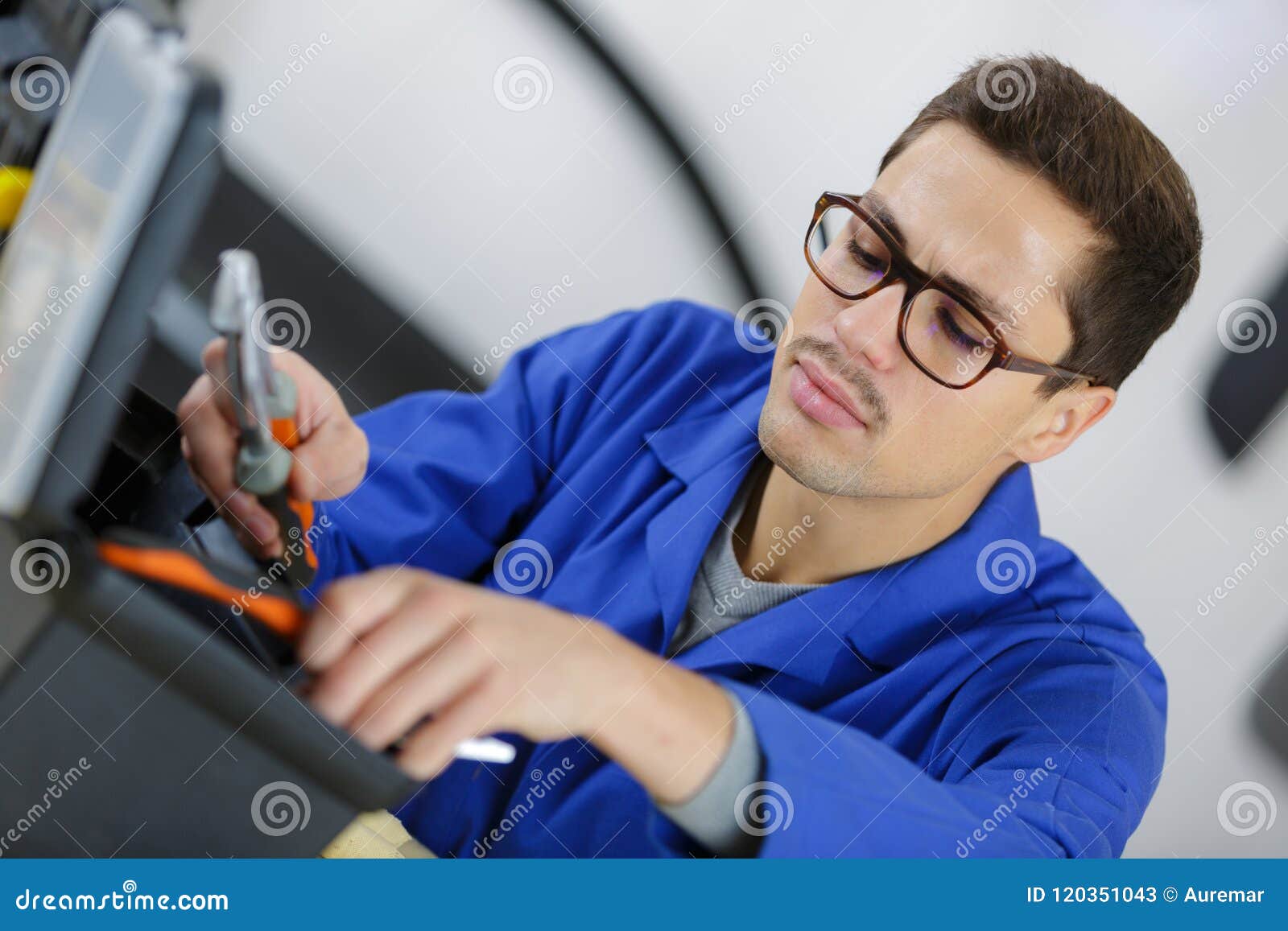 Technician Looking for Tool in Toolbox Stock Image Image of garment