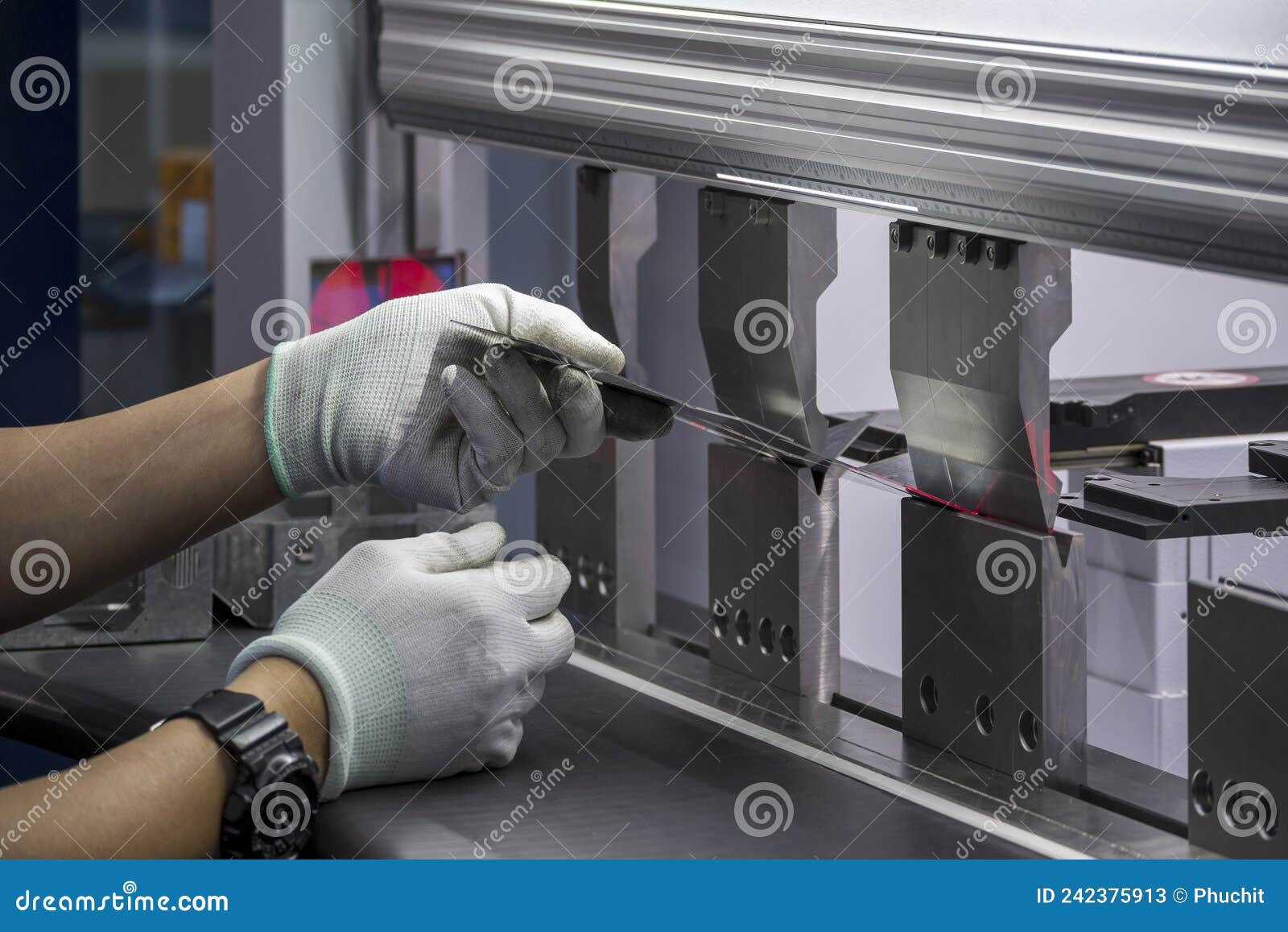 The Technician Operator Working with Hydraulic Bending Machine Control