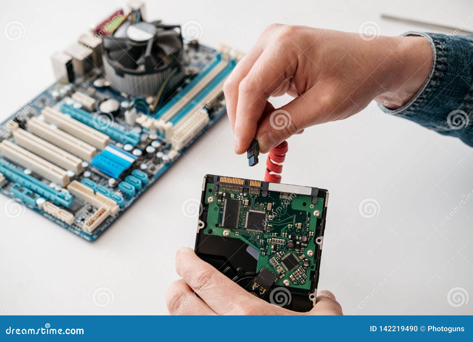 Technician Plugging SATA Serial at Attachment, Serial ATA Power Cable