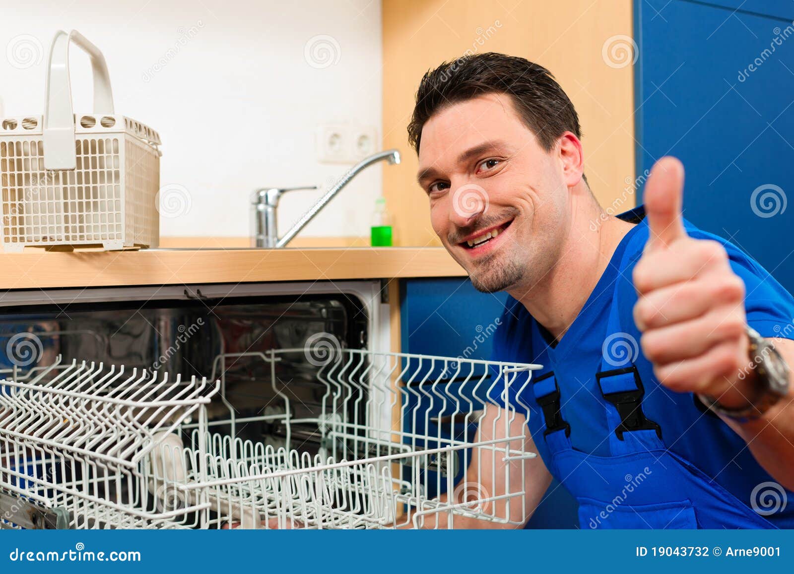 technician repairing the dishwasher