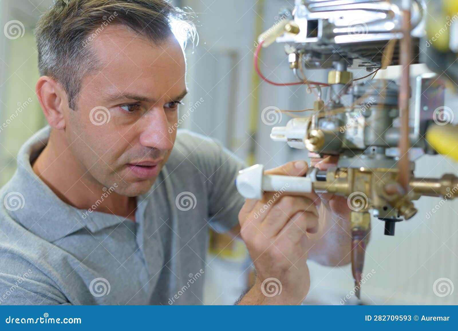 Technician Repairing Electric Boiler Stock Image Image of boiler