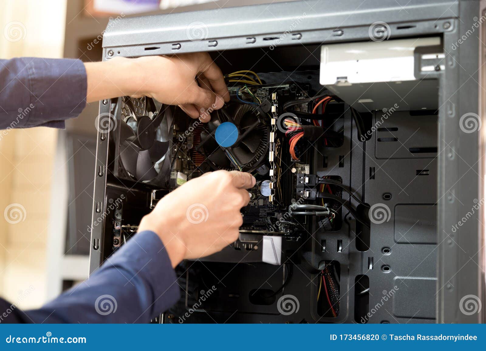 Technician with a Screwdriver for Fixing Computers, Computer Har Stock