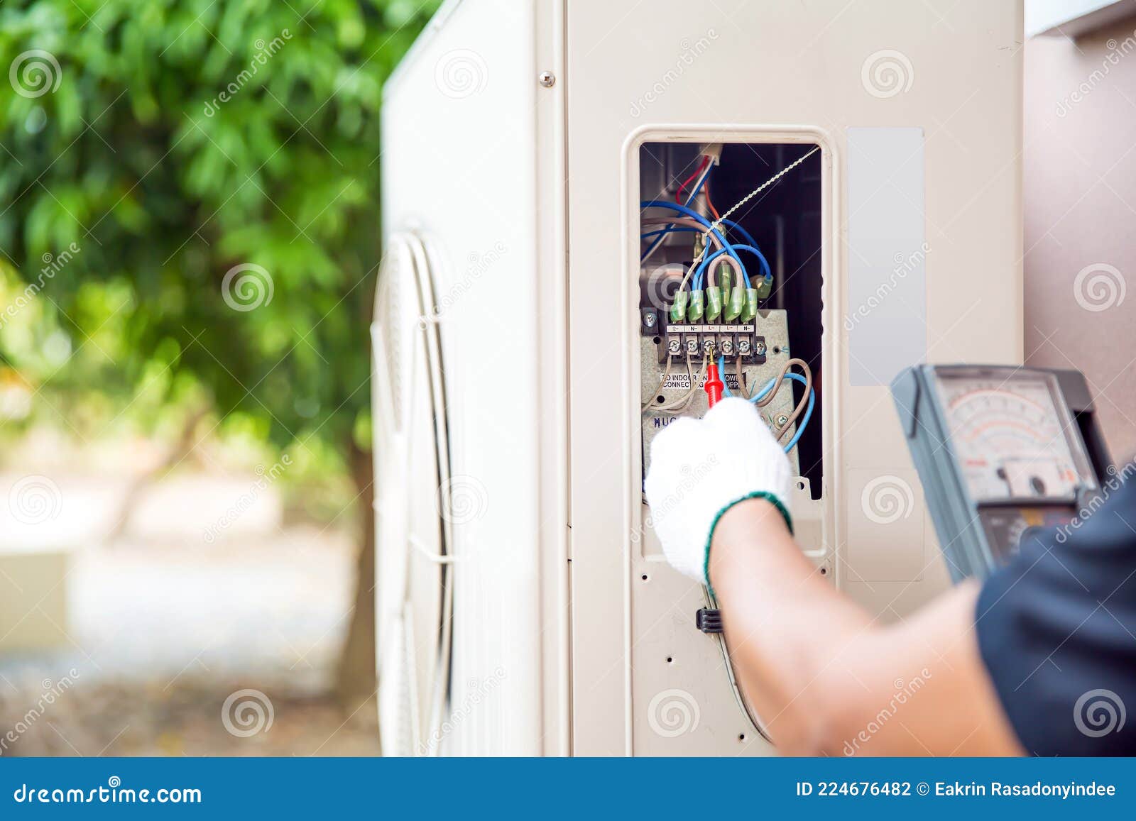 Technician Using Measuring Equipment Checking Electric at Circuit