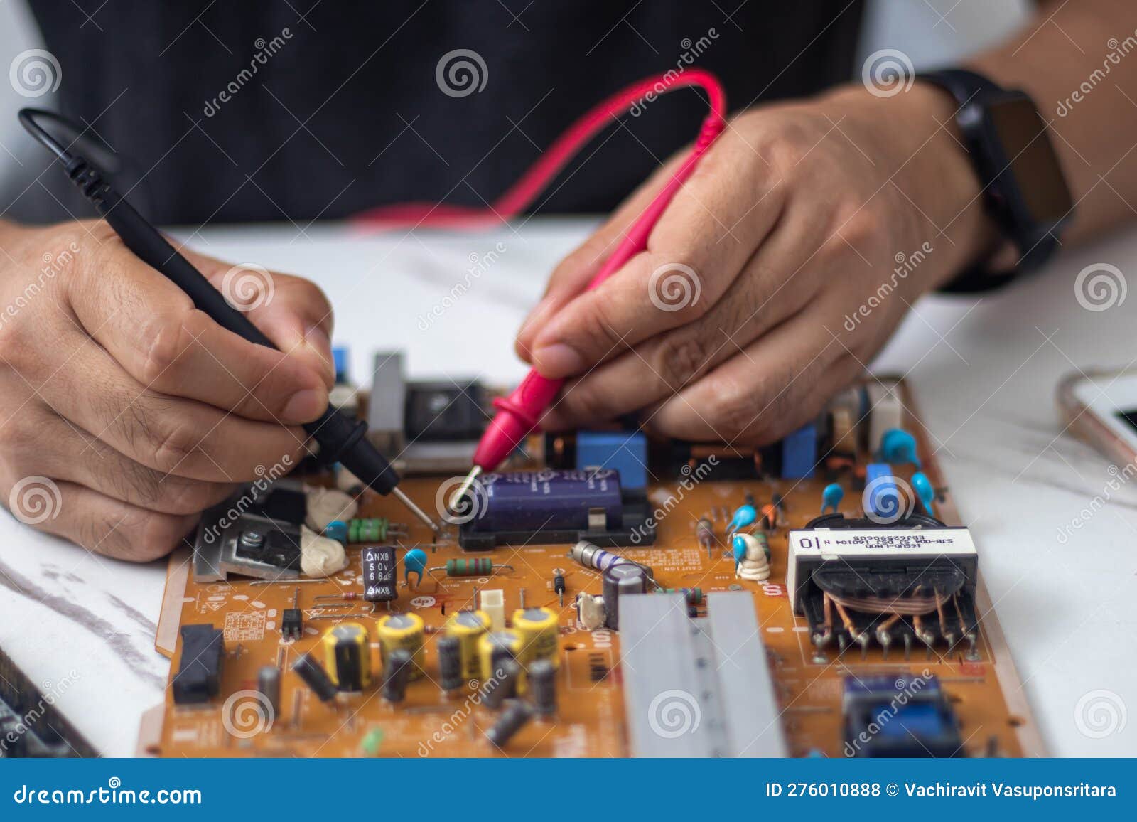 Technician Using Tool To Measure Circuit Board, Check and Repair Stock ... Circuit Diagram