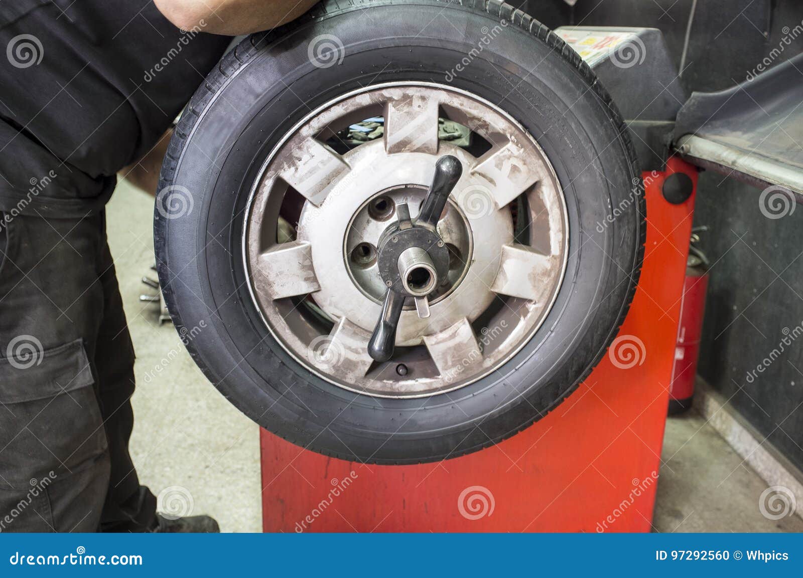 Technician Work with Mechanic Balancing Wheel Stock Photo Image of
