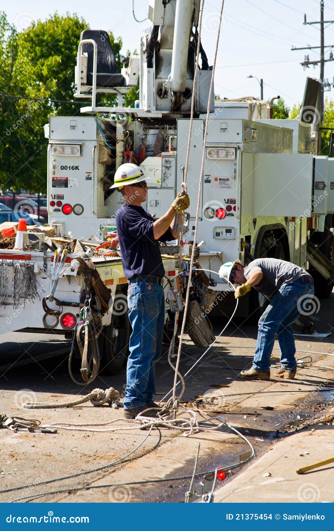 Technicians Clean Up in the Road Editorial Stock Image Image of smud