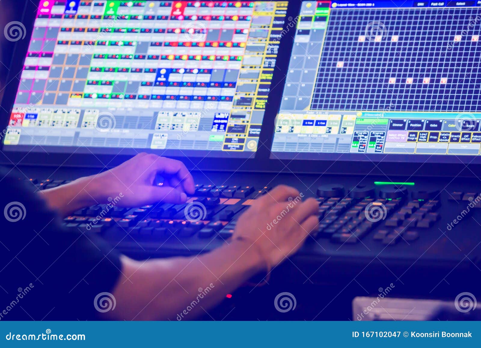 Technicians are Controlling the Sound System and Lighting System on the