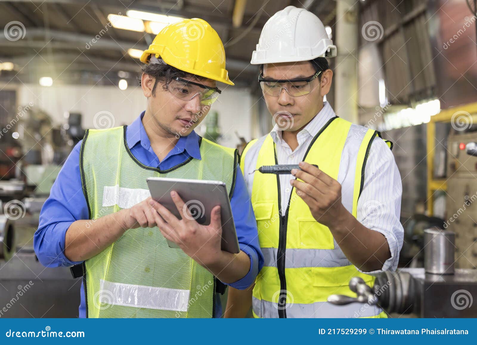 Technicians And Engineers Are Comparing The Parts Of The Spare Parts To