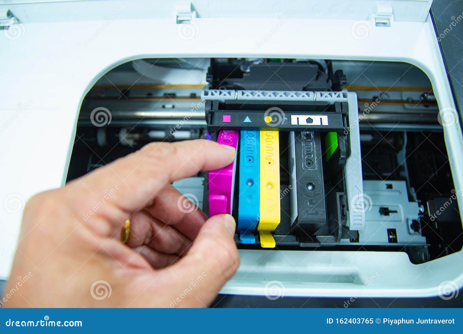 Technicians are Install Setup the Ink Cartridge of a Inkjet Printer the