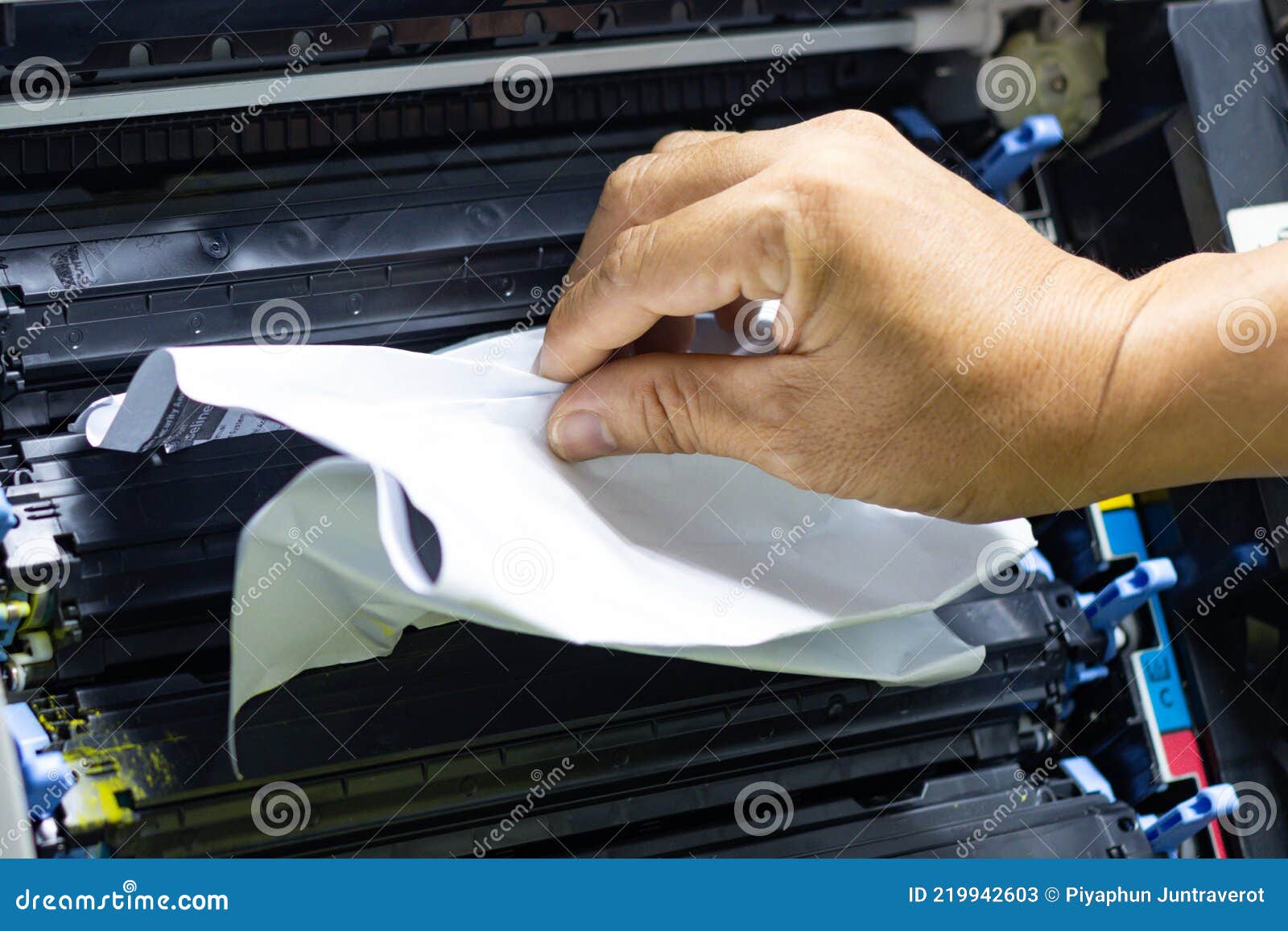 Technicians Removing Paper Stuck, Paper Jam in Printer at Office Stock