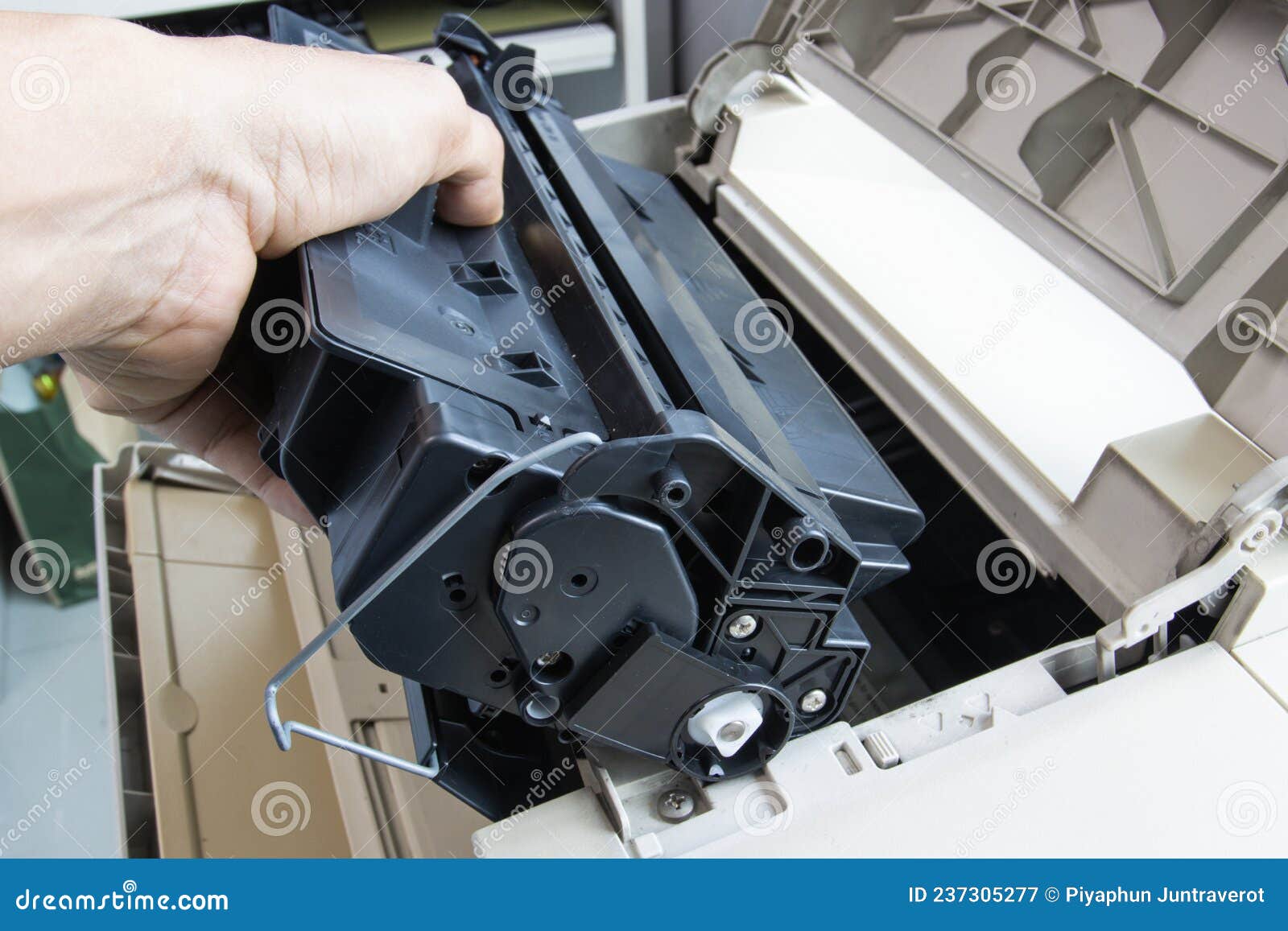 Technicians Replacing Toner in Laser Printer Concept Office Supplies