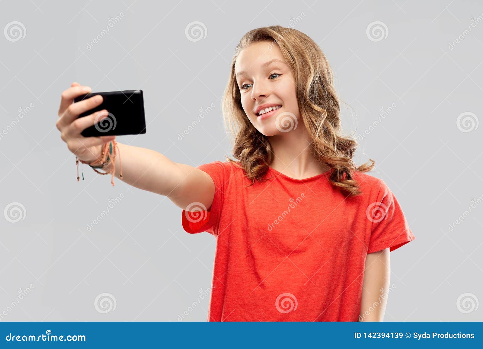 Smiling Teenage Girl Taking Selfie by Smartphone Stock Image - Image of ...