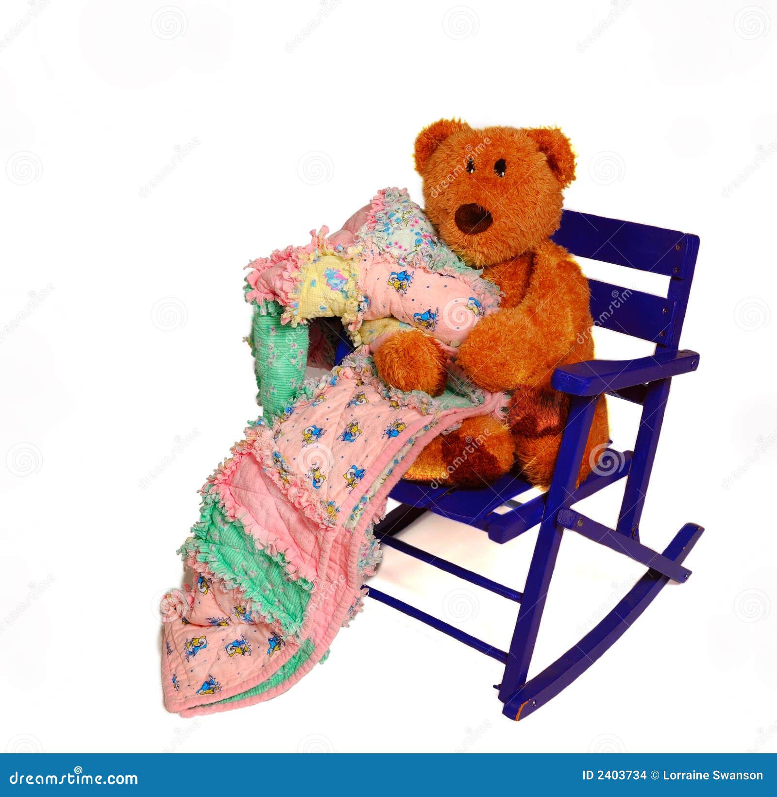 teddy bear sits on a vintatge rocking chair, cuddling with a rag 