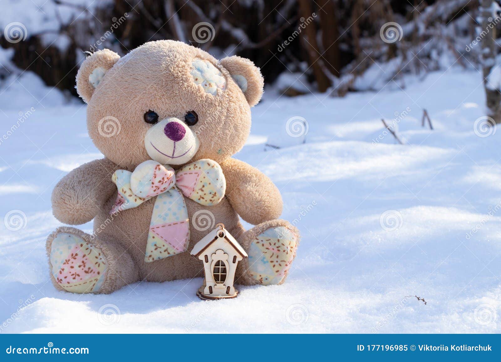 Teddy Bear and a Small Wooden House in the Snow on the Street in ...