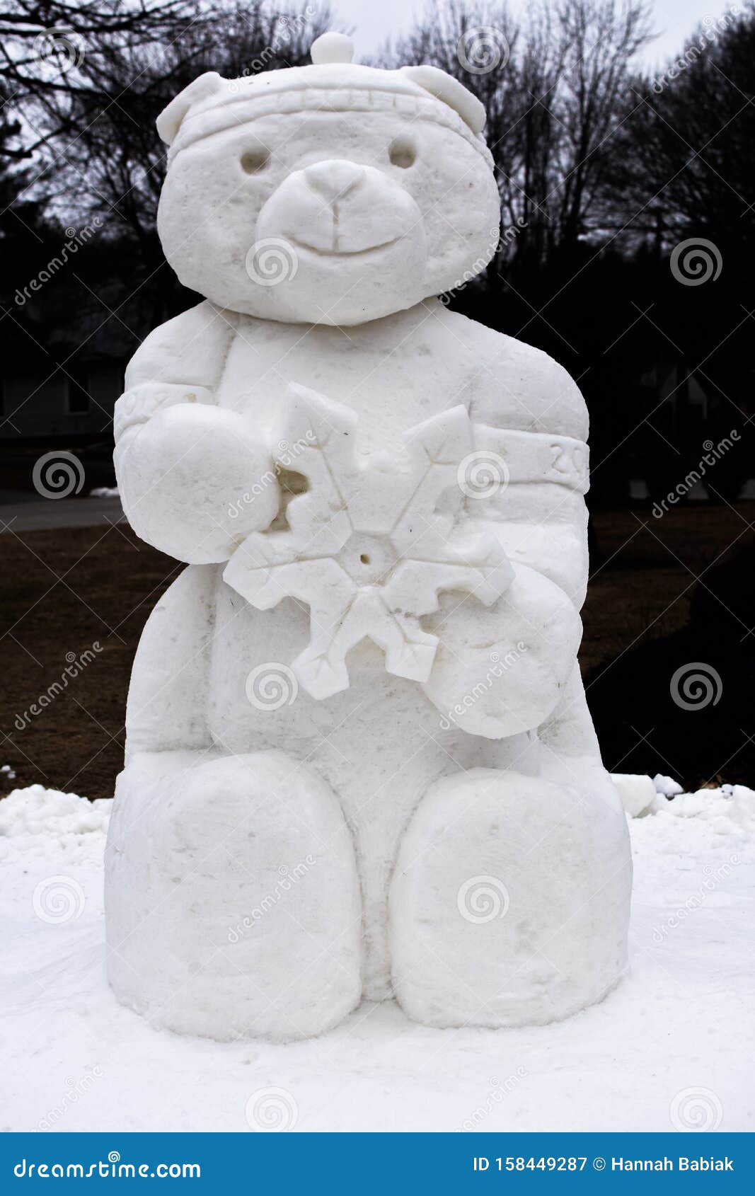 Teddy Bear Snow Sculpture Holding a Snowflake Stock Image Image of smile, snowing 158449287