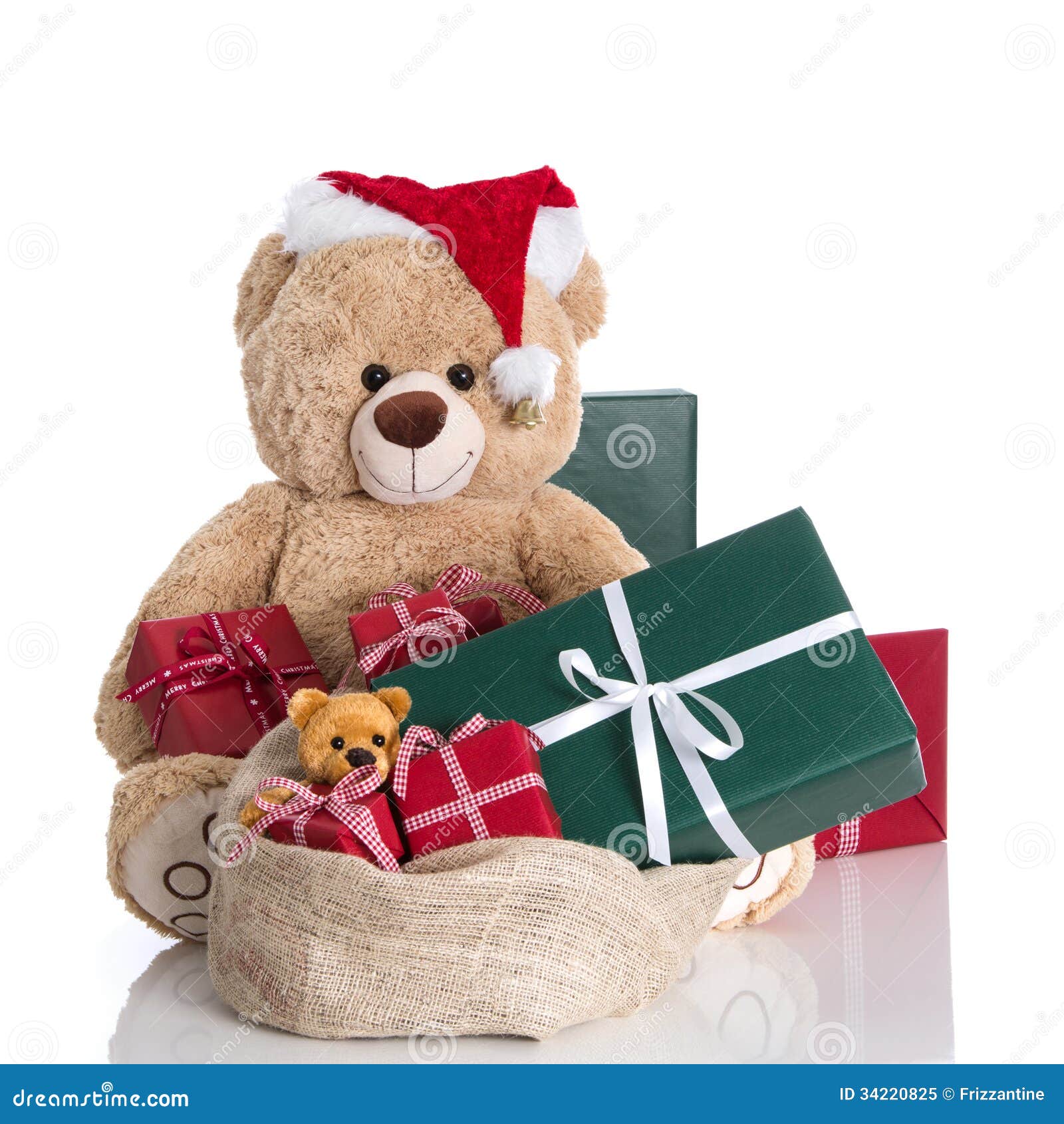 Teddy Bear Wearing Christmas Hat With Gifts Isolated On 