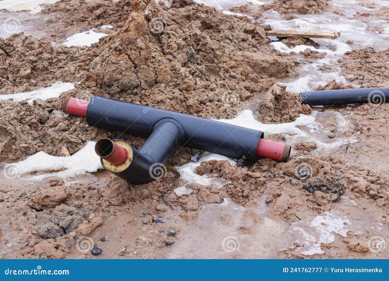 Tee Pipe for Heating. Insulated Pipe in a Plastic Coating for the
