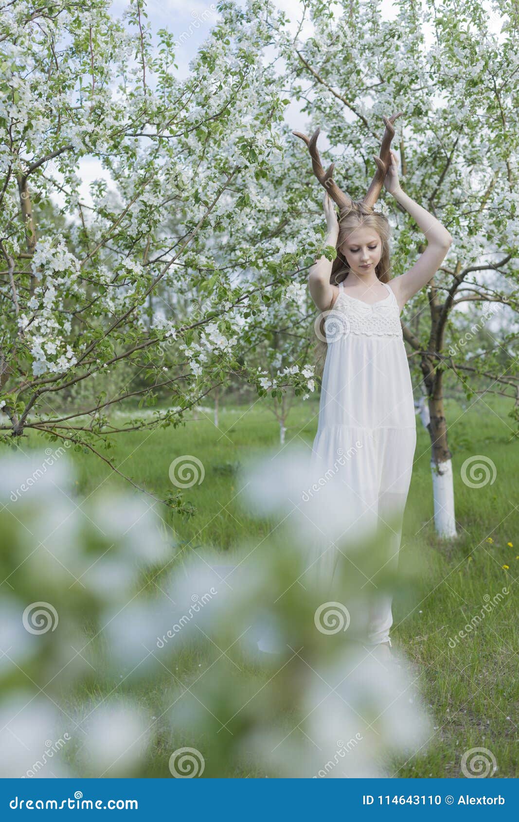 Teen Beautiful Blonde Girl Wearing White Dress With Deer