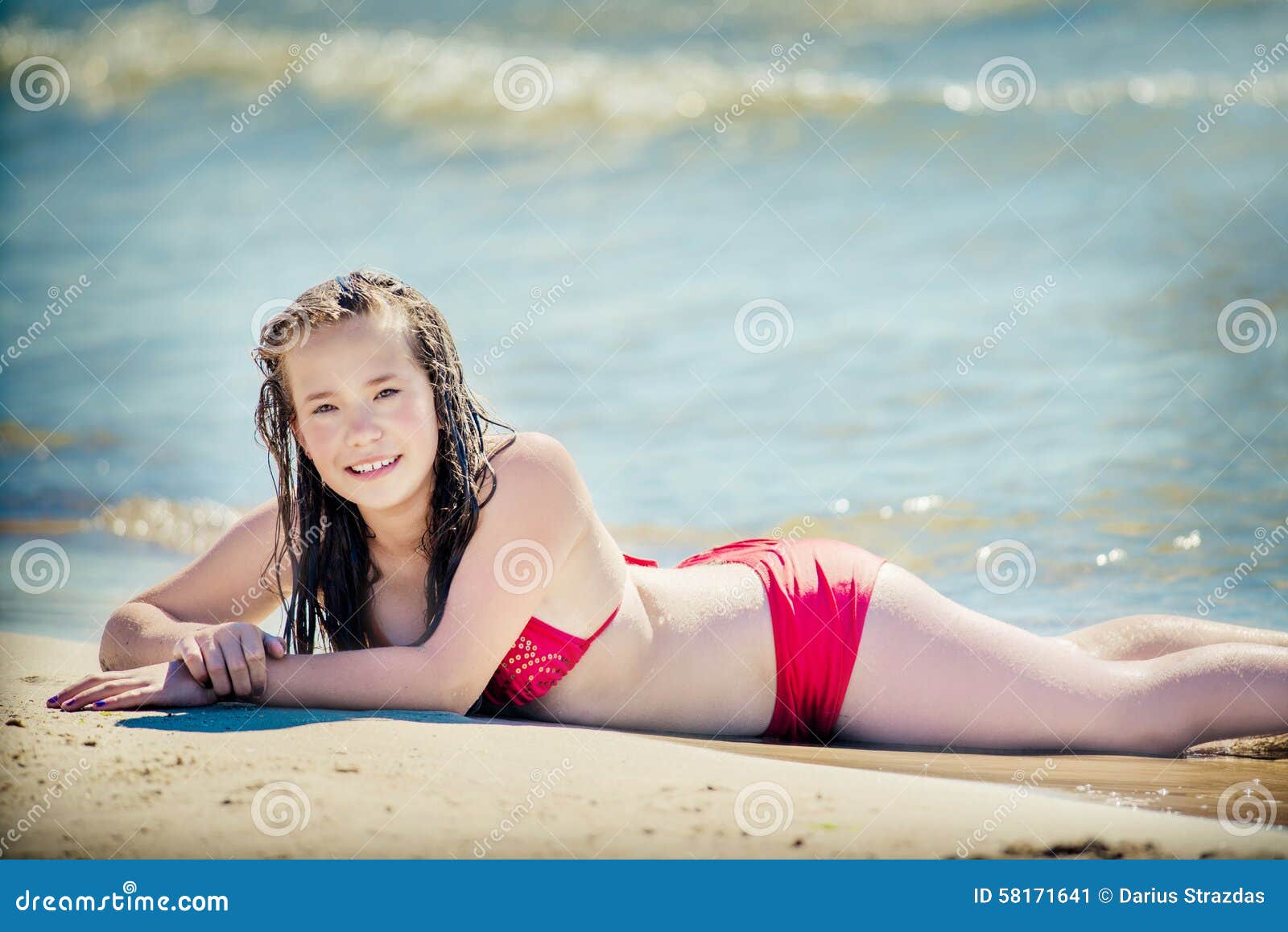 Young Teens In Bikinis At Beach