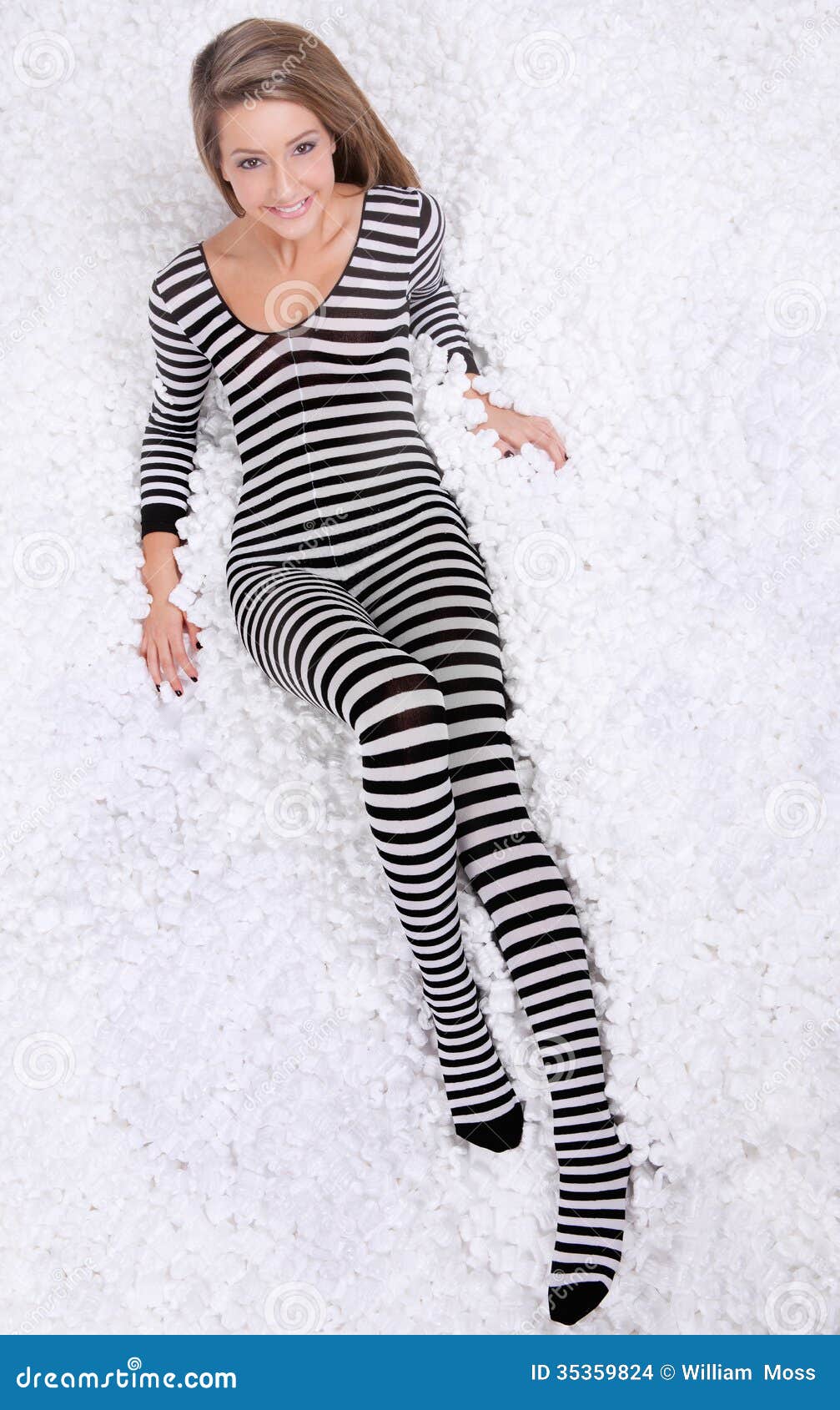 https://thumbs.dreamstime.com/z/teen-bodysuit-packing-peanuts-fun-image-teenage-girl-striped-lying-top-lot-white-35359824.jpg
