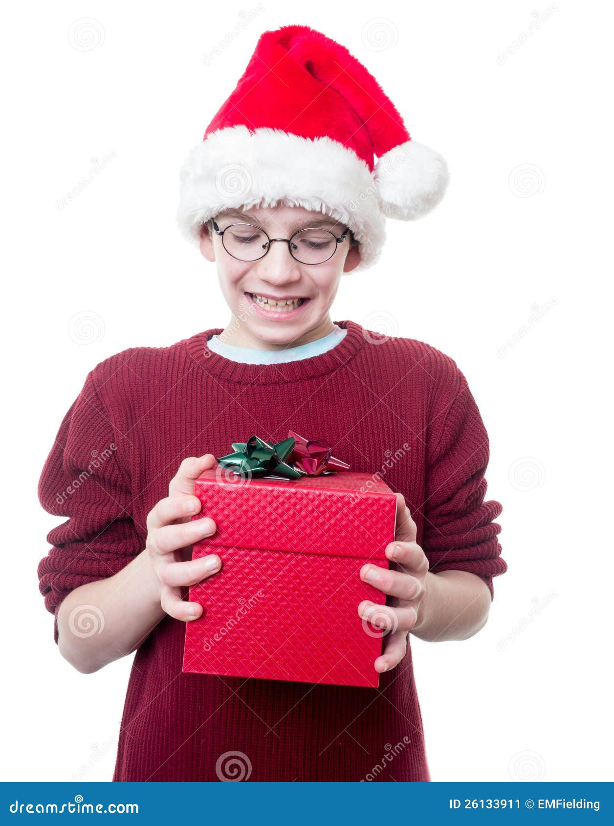 Teen Boy with Christmas Hat and Present Stock Image Image of present