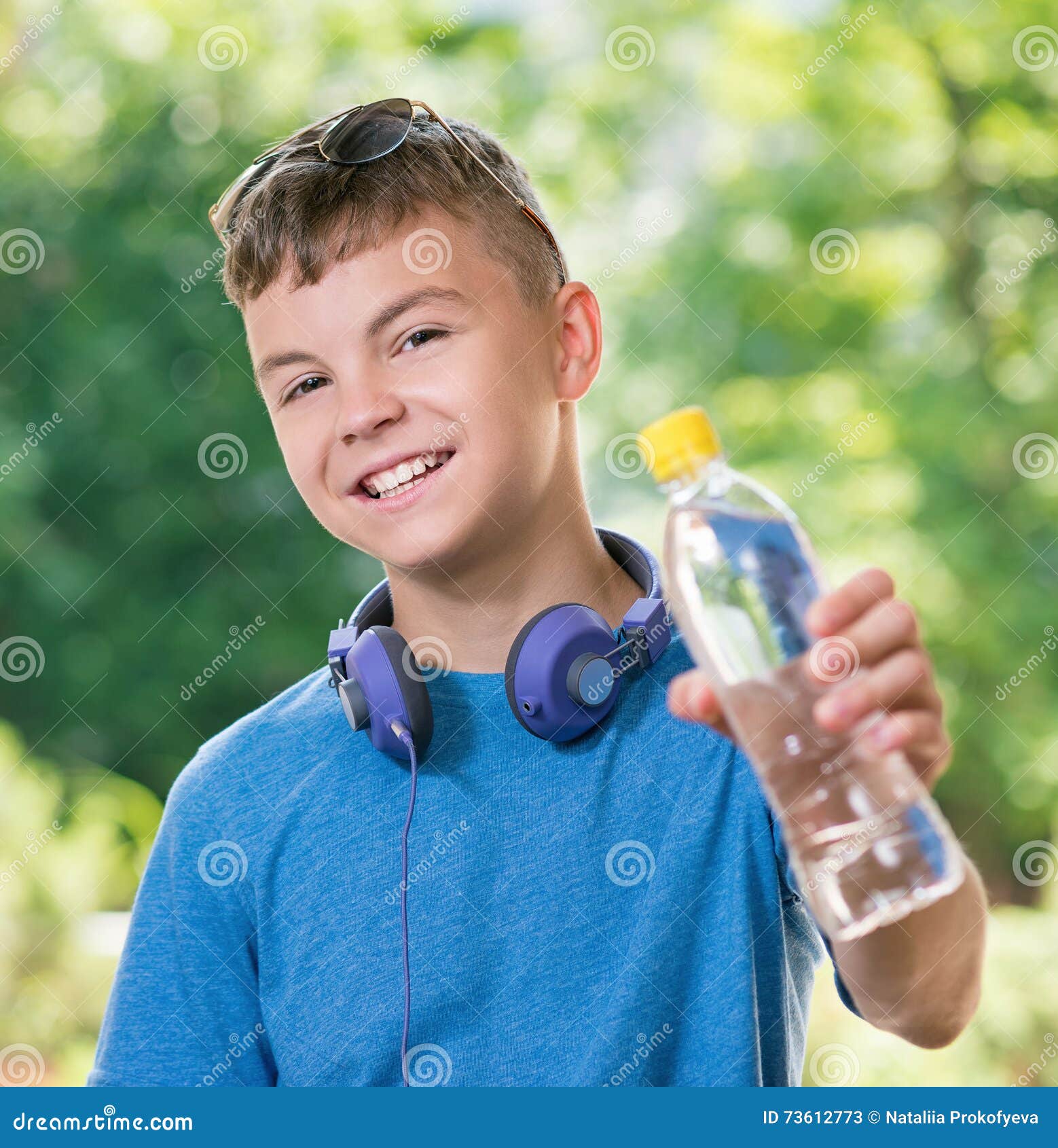 https://thumbs.dreamstime.com/z/teen-boy-water-year-old-bottle-fresh-student-teenager-headphones-sunglasses-posing-outdoors-73612773.jpg