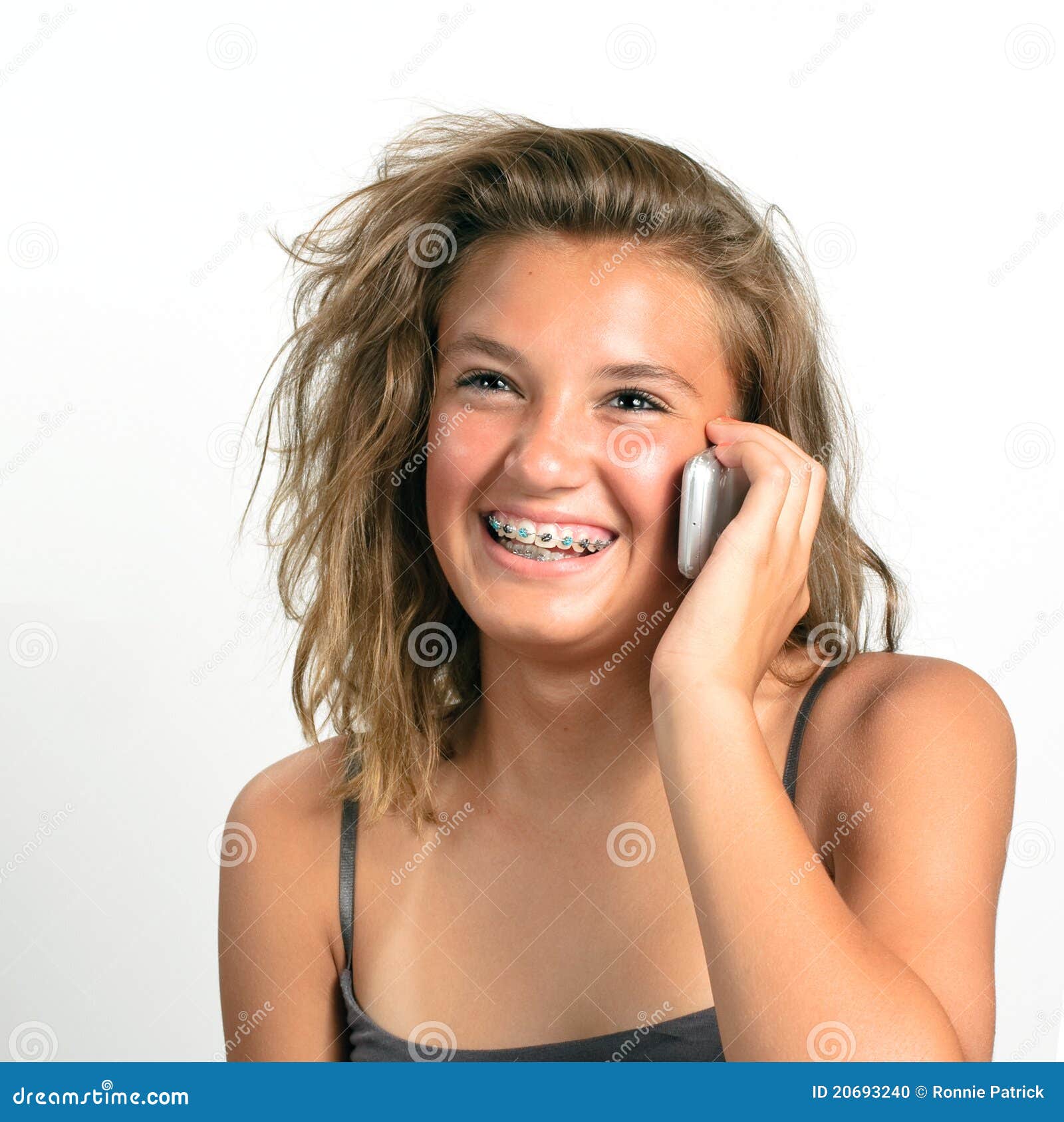 Teen girl on cell phone stock photo. Image of young, conversation