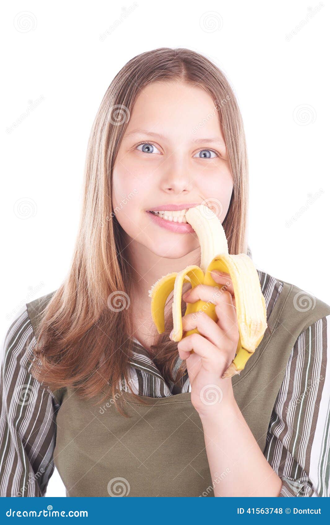 Teen girl eating banana stock photo. Image of organic - 41563748