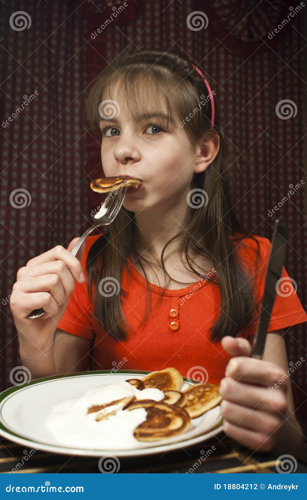 Teen girl eats a pancake stock photo. Image of cake, cuisine 18804212