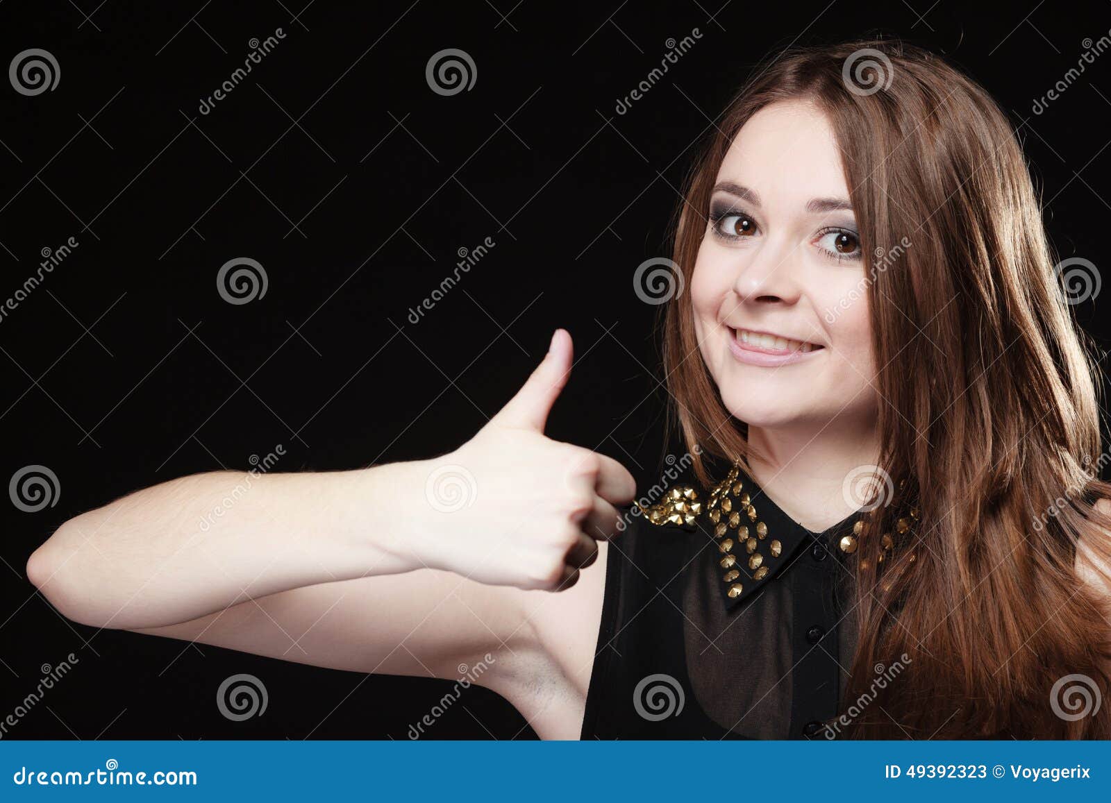 Teen Girl Giving Thumbs Up Sign on Black Stock Image amateur picture Teen Girl Giving Thumbs Up Sign on Black Stock Image picture