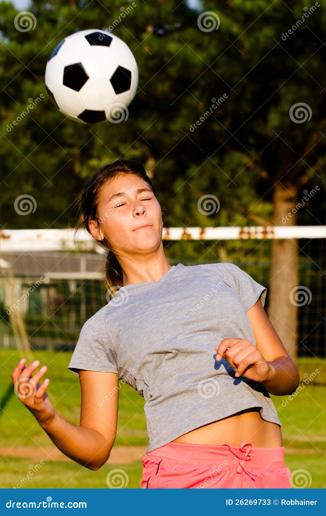 Teen Girl Heading Soccer Ball Stock Image Image Of Child P