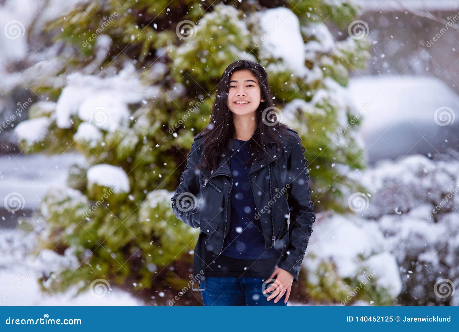 Teen Girl Outdoors during Snowfall Wearing Black Leather Jacket Stock ...