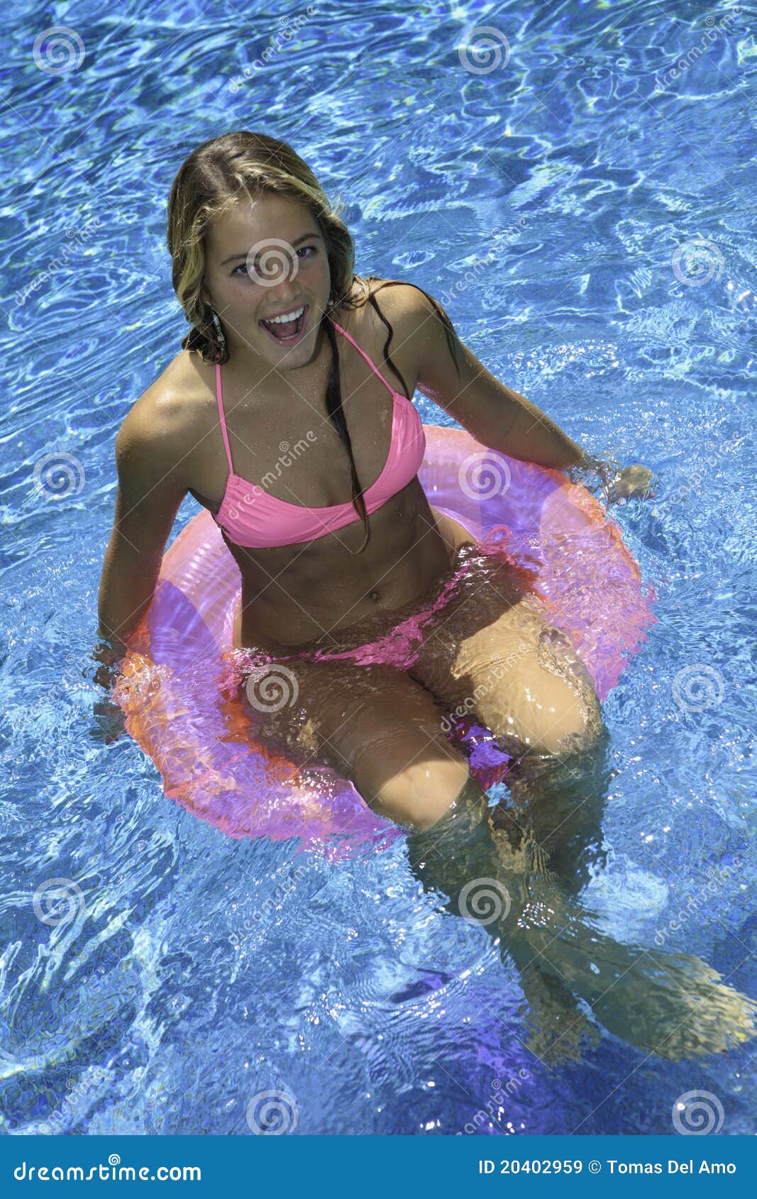 Teen Girl in Pink Bikini on a Float Stock Image - Image of outdoors,  portrait: 20402959