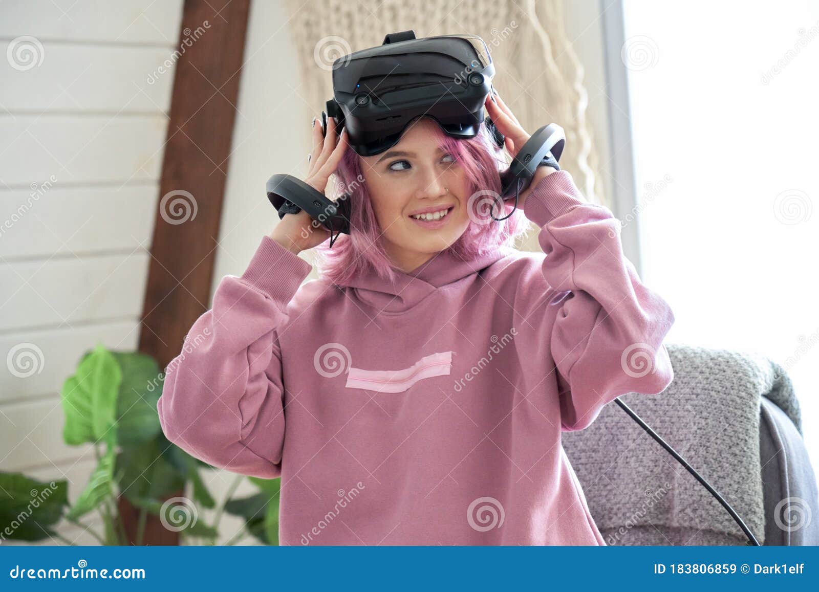 Young Asian Woman Wearing Virtual Reality Goggles. Headset 