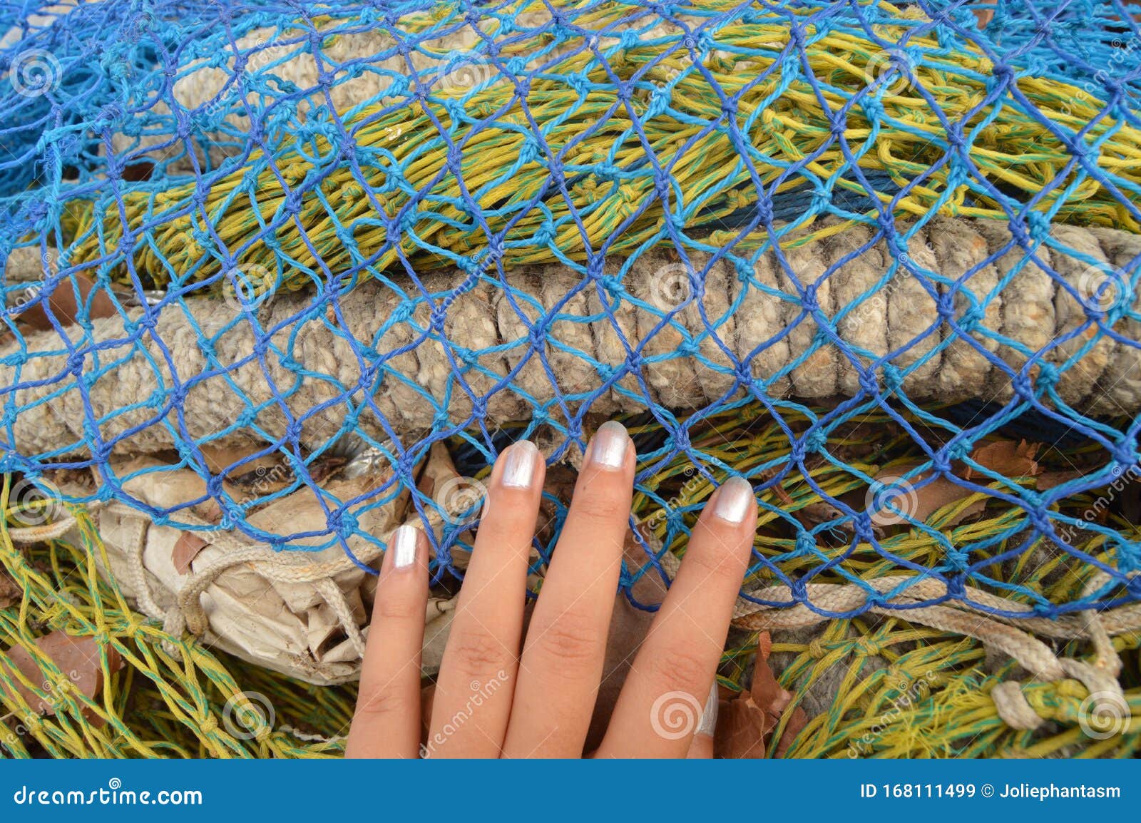 Teen Girl`s Hand Touching Colourful Fishing Nets Stock Image - Image of  organic, color: 168111499