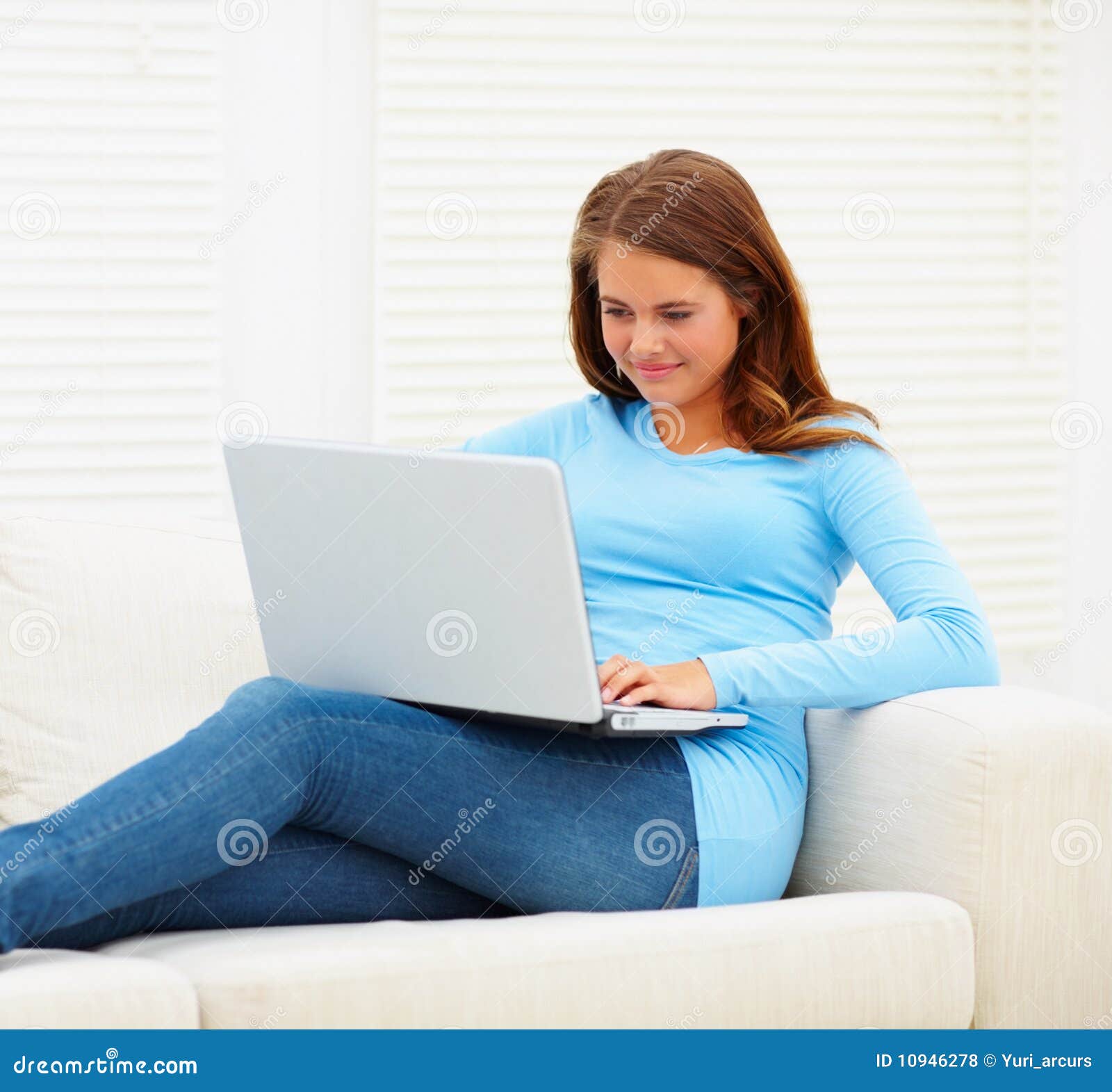 Teen Girl Sitting at Home Working on a Laptop Stock Photo - Image of ...