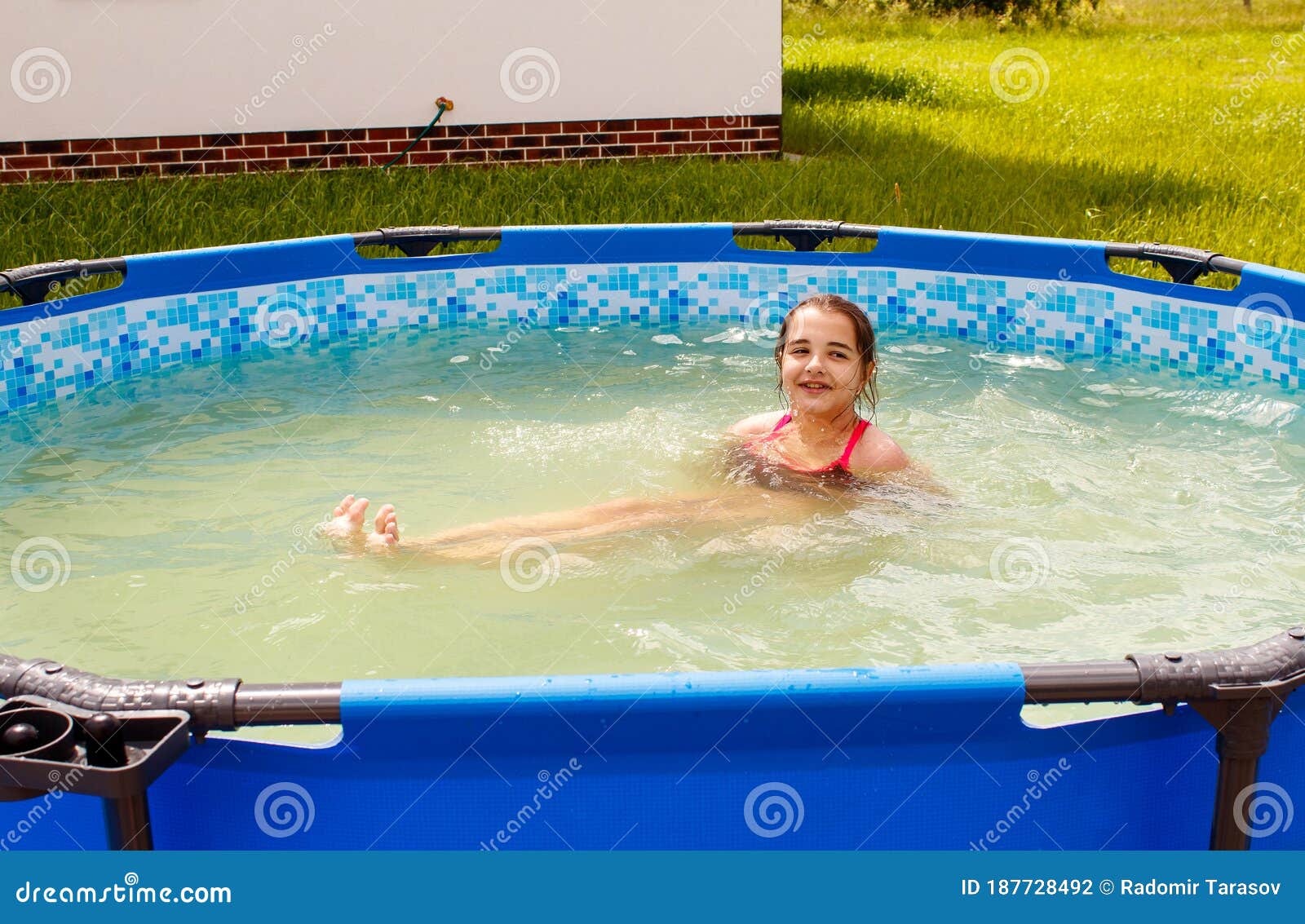 Teen Girl Is Swimming In A Small Pool Stock Photo Image Of Outsi