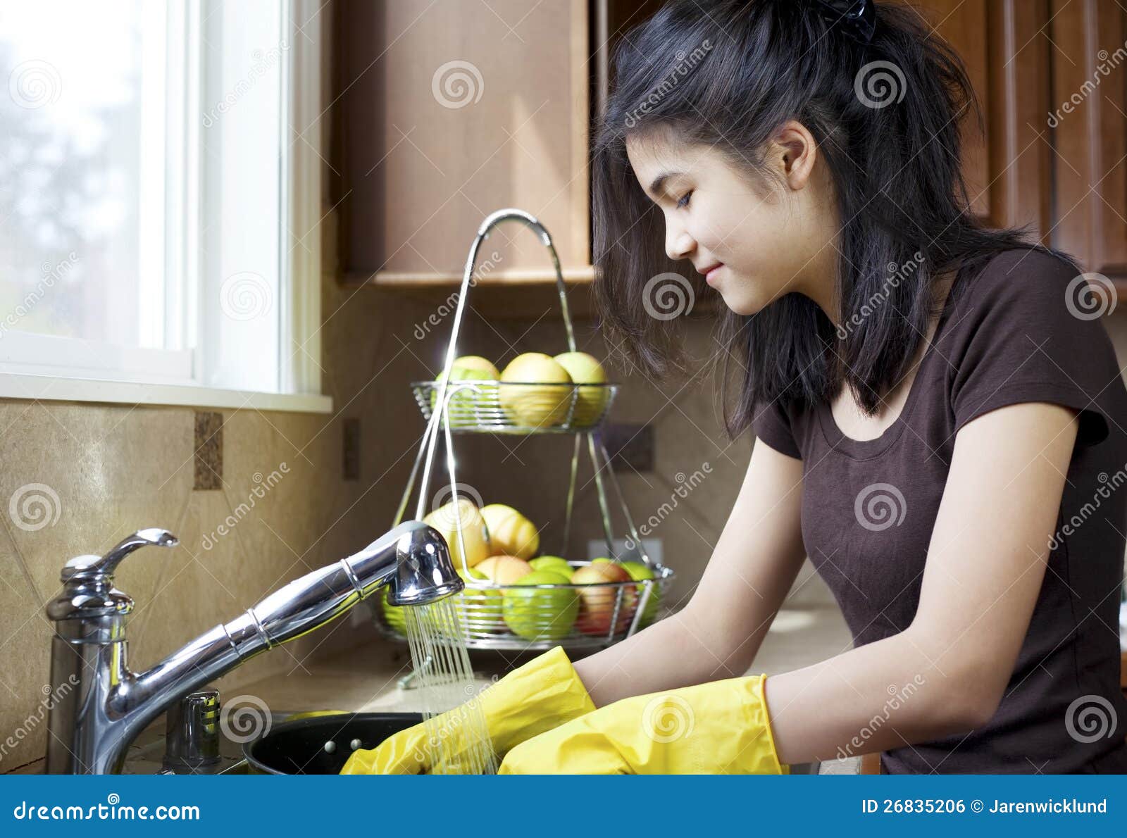 Teen Girl Washing Dishes In Kitchen Stock Photo Imag