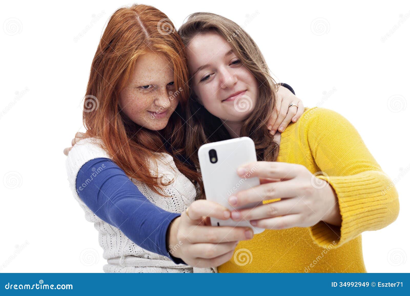 Teen girls with phone stock image. Image of caucasian - 34992949