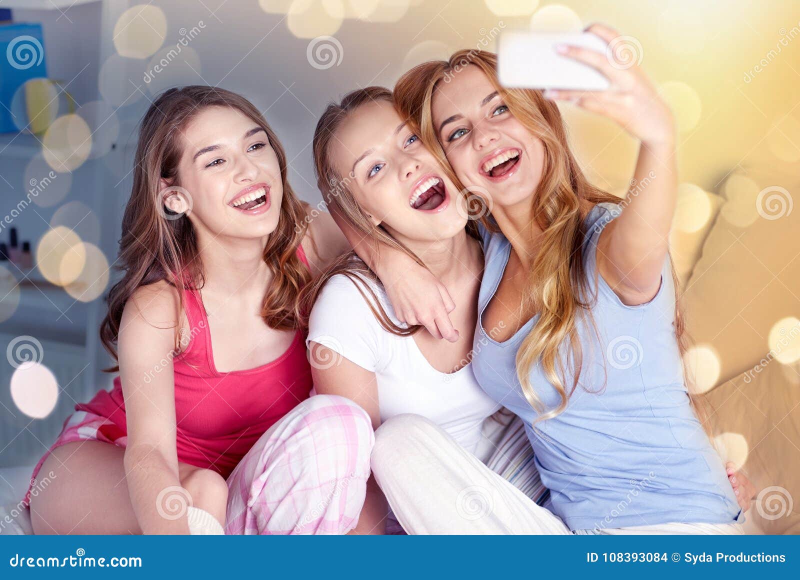 Teen Girls With Smartphone Taking Selfie At Home Stock