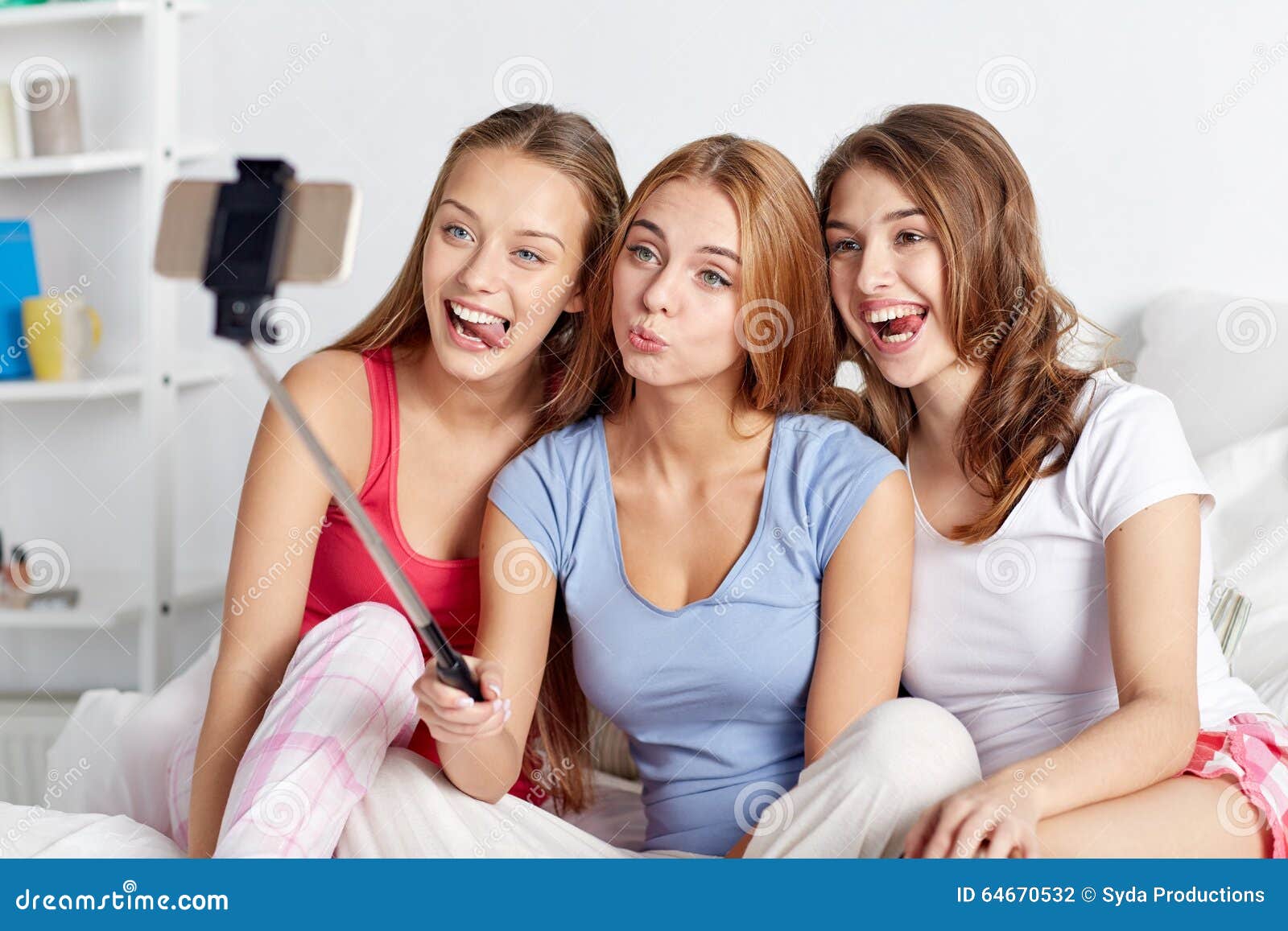 Teen Girls With Smartphone Taking Selfie At Home Stock