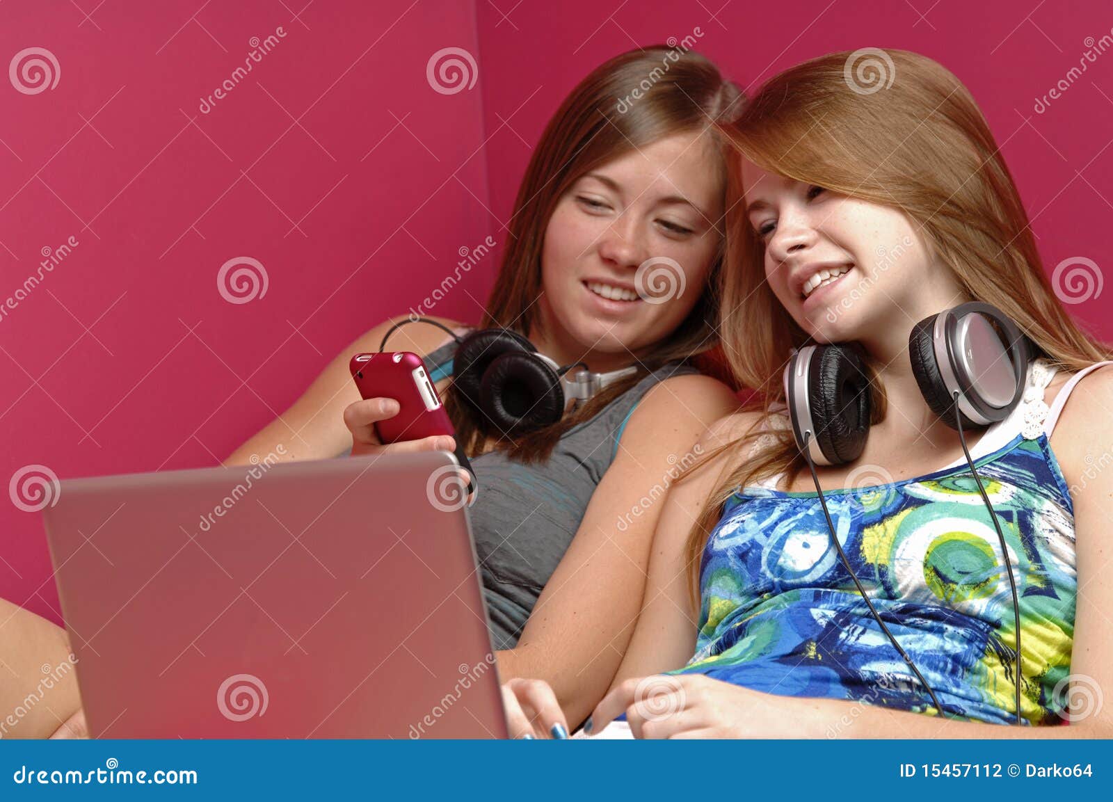 Teen Girls Using Electronics Stock Photo Image of cellphone
