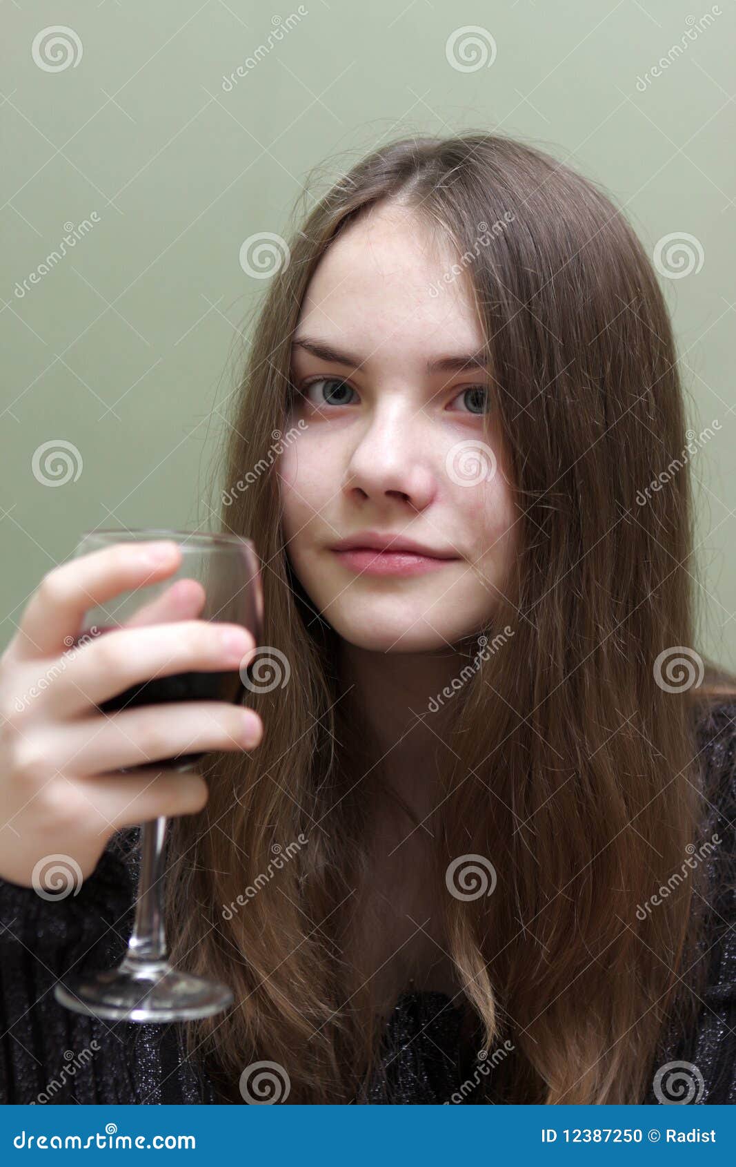 Teen with glass of wine stock photo. Image of holding 12387250